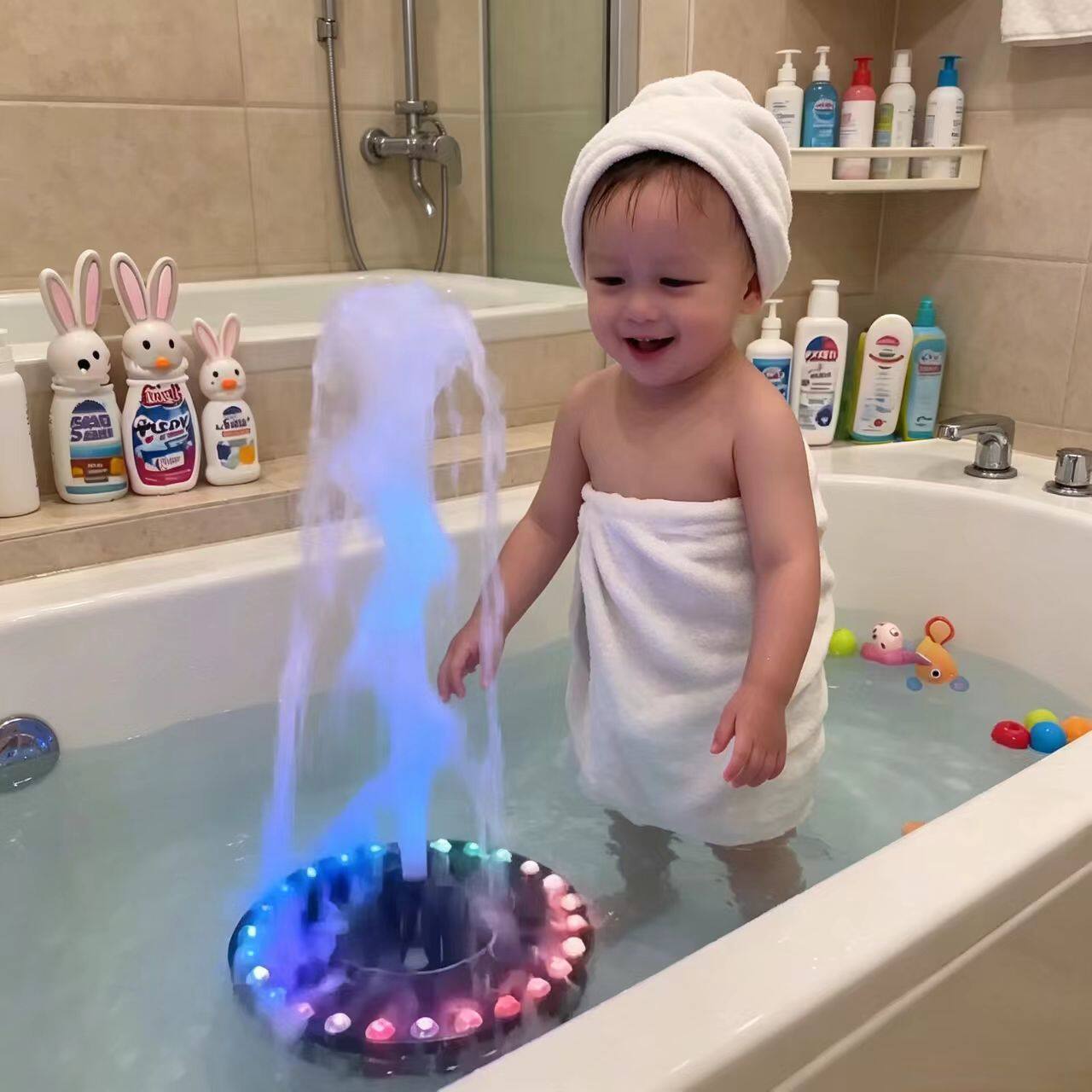 没有孩子能拒绝会喷泉的洗澡玩具图片