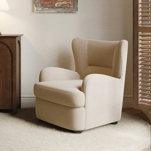 一张舒适有包裹感的单人沙发