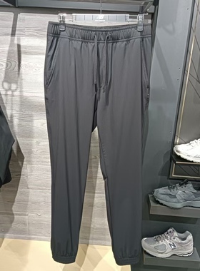 特价清仓New Balance/NB男裤2025秋休闲梭织收口长裤男 AMP53319