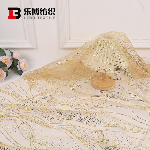 现货水波纹香槟金亮片网纱婚庆婚纱桌布礼服玩具面料婚庆专用