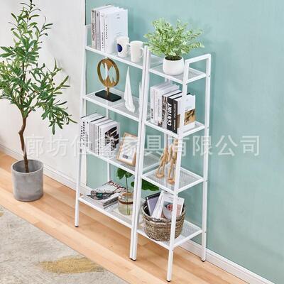 Home kitchen set-up of iron-sheltered bookshelves on the bal