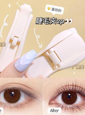 The cats paws and eyelashes are wrapped up in a persistentl