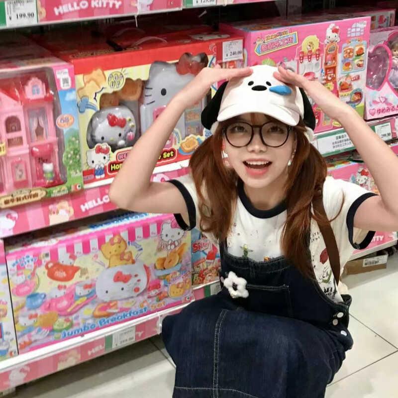 A cute, sleepy dogs baseball hat sweet girl with the idea o