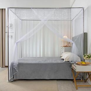 A double-bed mosquito net with an old bed net with a 1-metre
