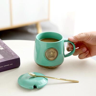 Macceramic cup of coffee and gift box for the copper scale o