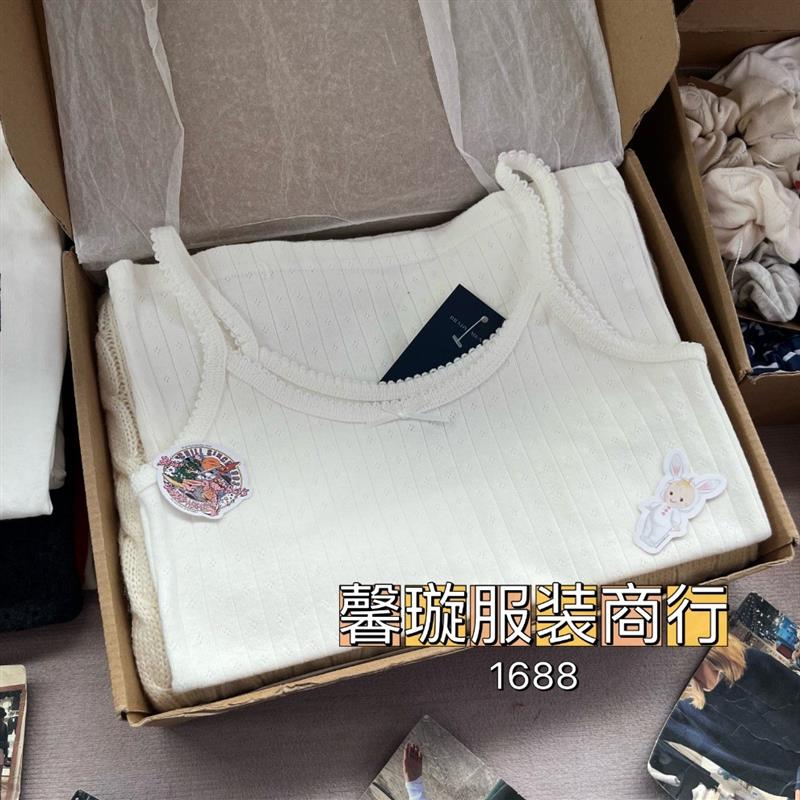 BM wind, flowers and butterflies, gargoyles, a woman wearing