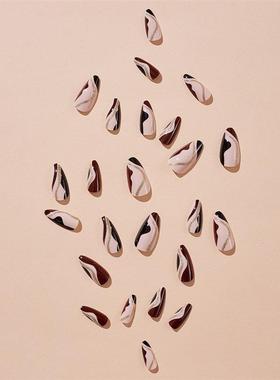 Acupunctures in caps can be deactivated with fake fingernail