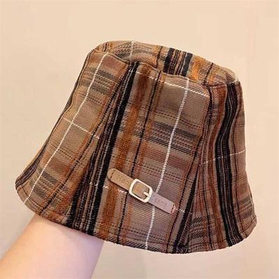 The Han chalked bucket cap girl has a flat face like Meadows