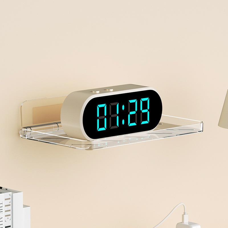 On the toilet shelf wall, there is a foldable collection box