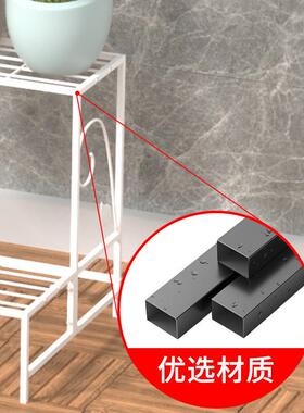 Theres a multi-storey iron-stair-stairted flower rack on th