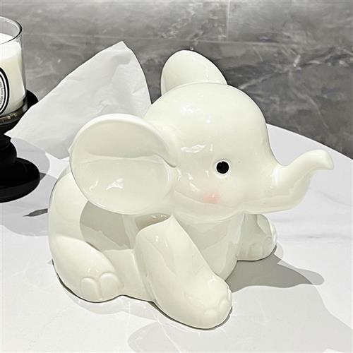 Cute Elephant tissue box, tableclothing paper, and a few hig