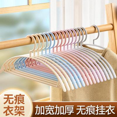 Plastic household hangers with wide, mark-free shoulders tha