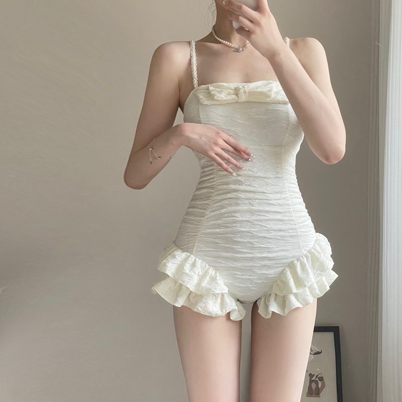 可爱保守显瘦小胸聚拢连体泳衣