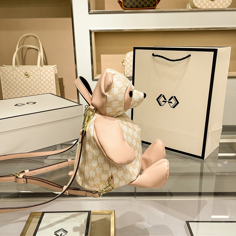 MK双肩包女2021新款潮时尚秋冬小众设计超火小熊儿童背包可爱包包