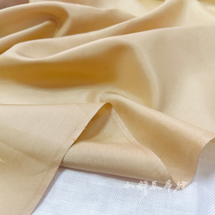 轻薄淡姜黄色细腻平纹天丝棉面料设计师衬衫连衣裙衣服装布料