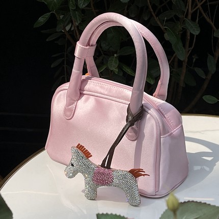 HAI英国高级感手提拎拿包真丝绸缎纯色休闲百搭女包ins风小众设计