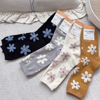 韩国东大门秋冬款复古大花朵中筒袜奶白色姜黄色纯棉透气堆堆女袜