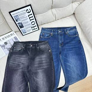 26022642 显瘦扭曲缝线高腰微喇牛仔长裤 极简风个性 百搭时尚