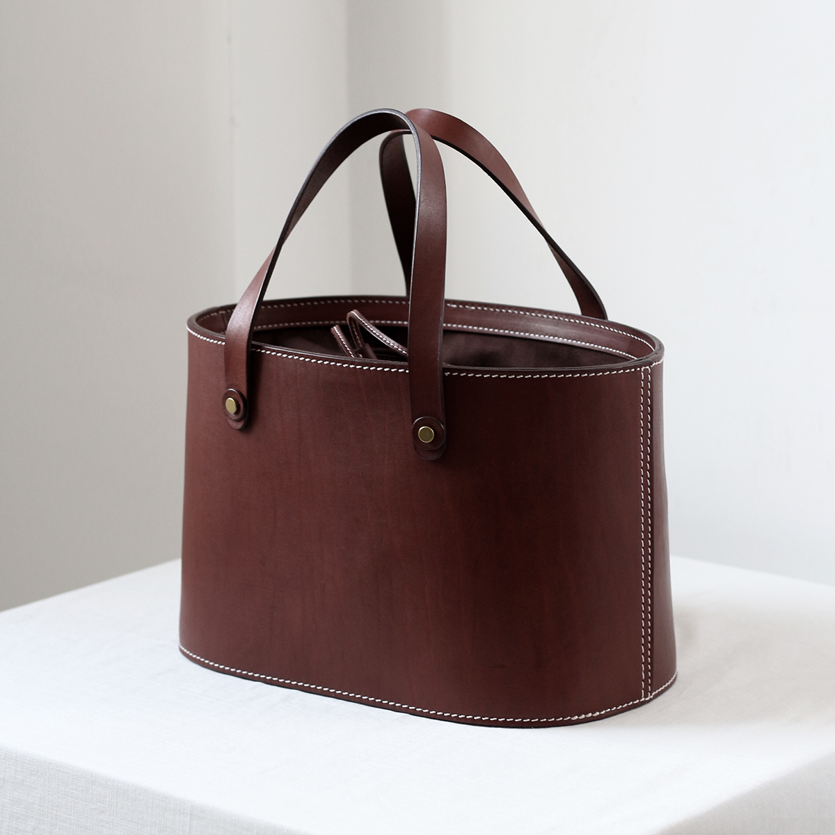 荣轻复古手工牛皮手提大号水桶包