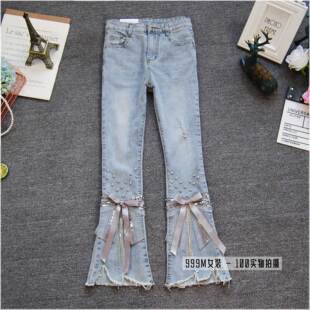 女高腰钉珠流苏带钻蝴蝶结不规则磨破牛仔裤 9分喇叭裤 时尚 春夏季