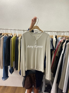 ROMANTICIZE Amy韩代 25fw  东大门 纯色半开扣 长袖t恤 简约百搭