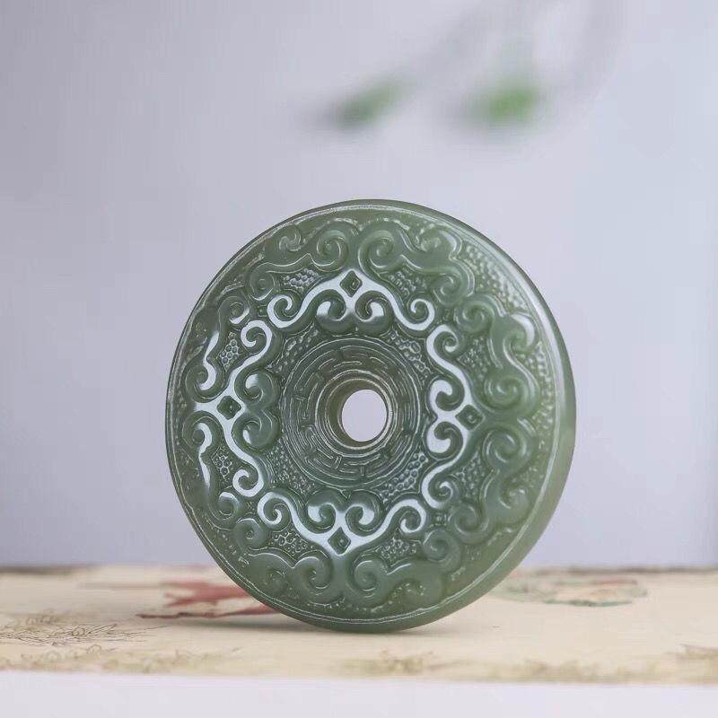 玉新疆和田玉晴水料花纹祥云吊坠