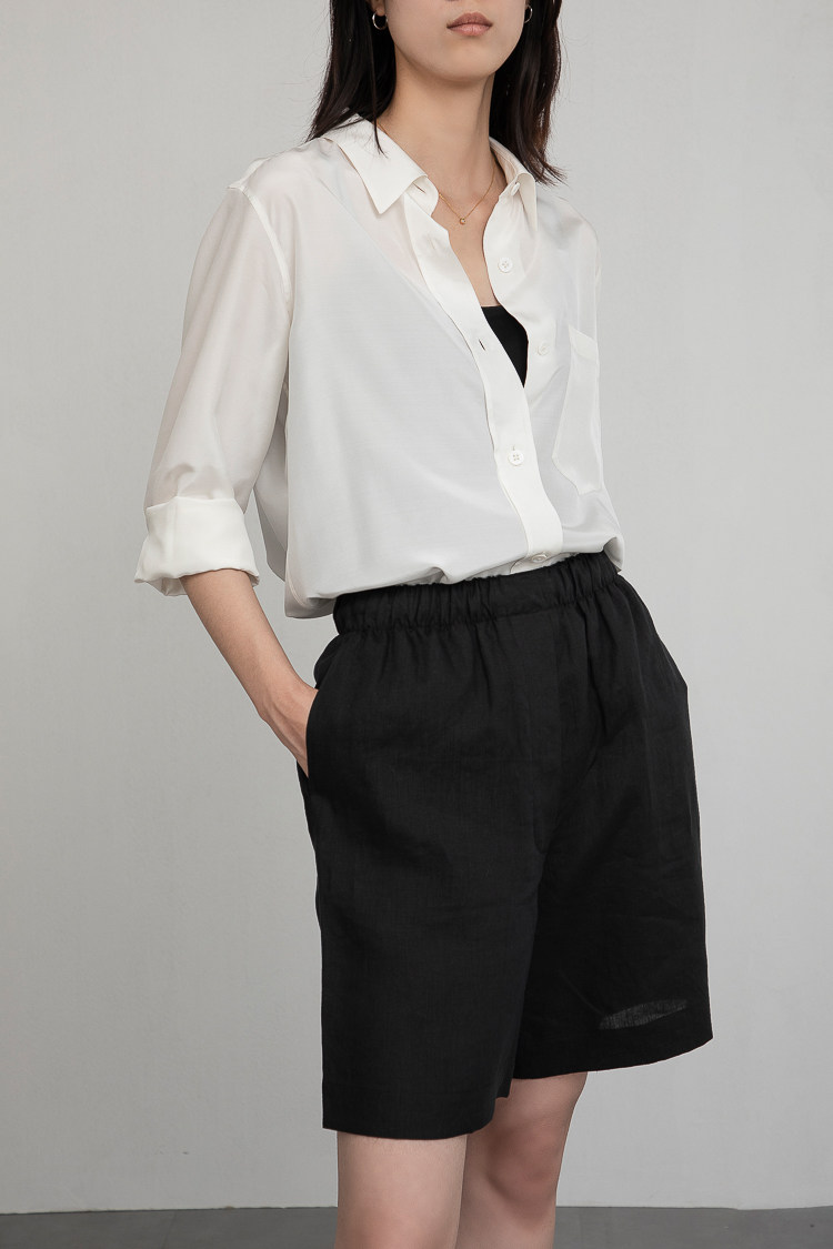 团长家2025高端真丝长袖口袋宽松廓形翻领通勤经典极简静奢衬衫