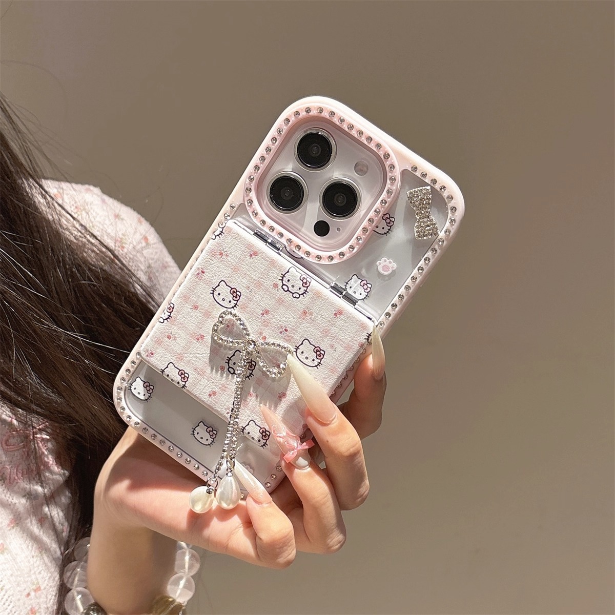 可爱闪钻KT适用苹果17promax手机壳iPhone16化妆镜15防摔14蝴蝶结粉格粉波点