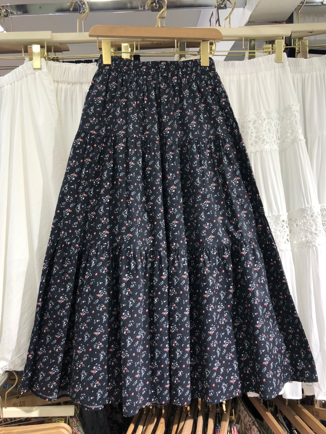 小碎花松紧腰半身裙女2026春季新款减龄气质蛋糕裙口袋大摆伞裙子