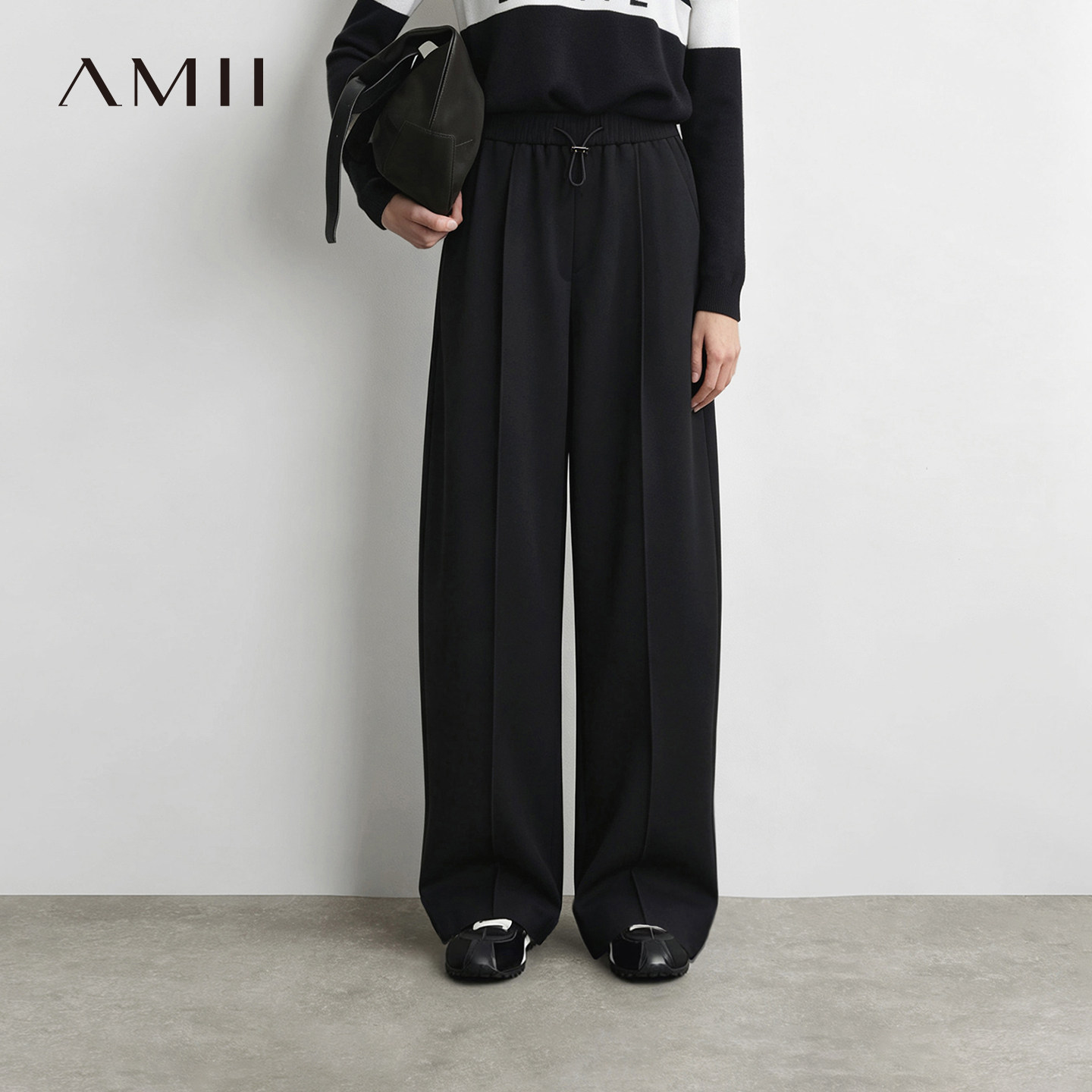 Amii2026冬新款调节扣橡筋抽绳牙签褶弯刀裤休闲长裤女宽松裤子
