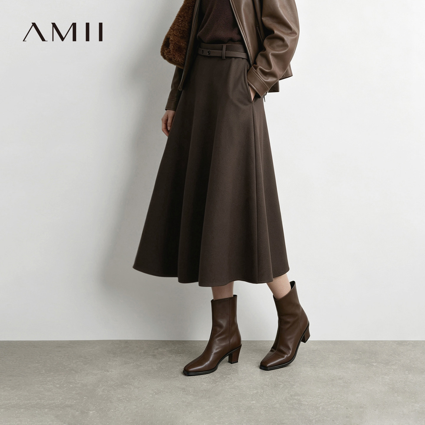 Amii2026冬新款通勤风撞色纽扣腰带A字裙半身裙女宽松中长裙子