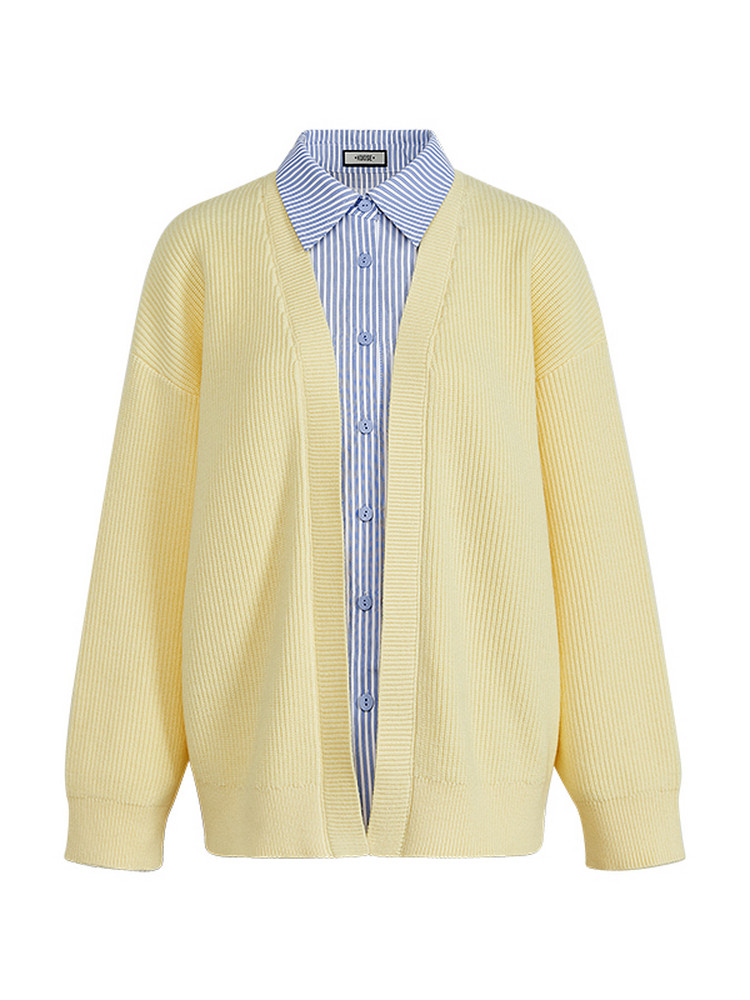 Yellow cardigan layered over a blue striped button-up shirt on a white background