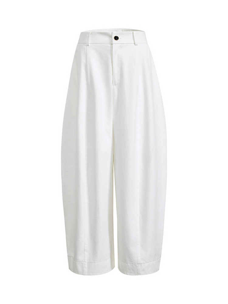 White wide-leg pants on a plain background