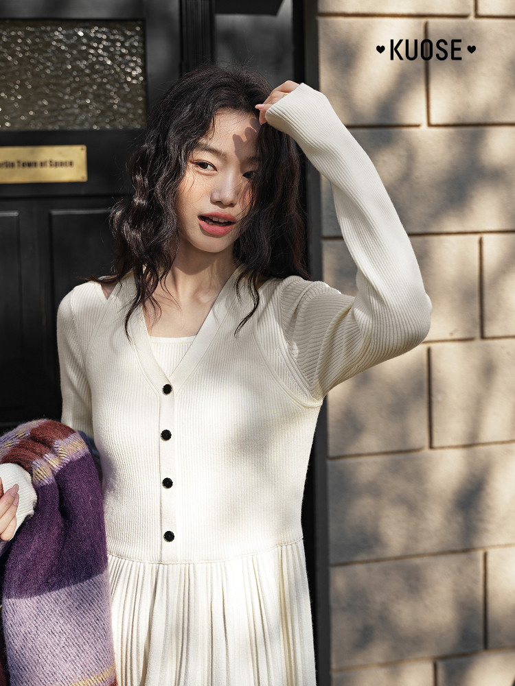 Cream ribbed long-sleeve button-front dress worn by a model