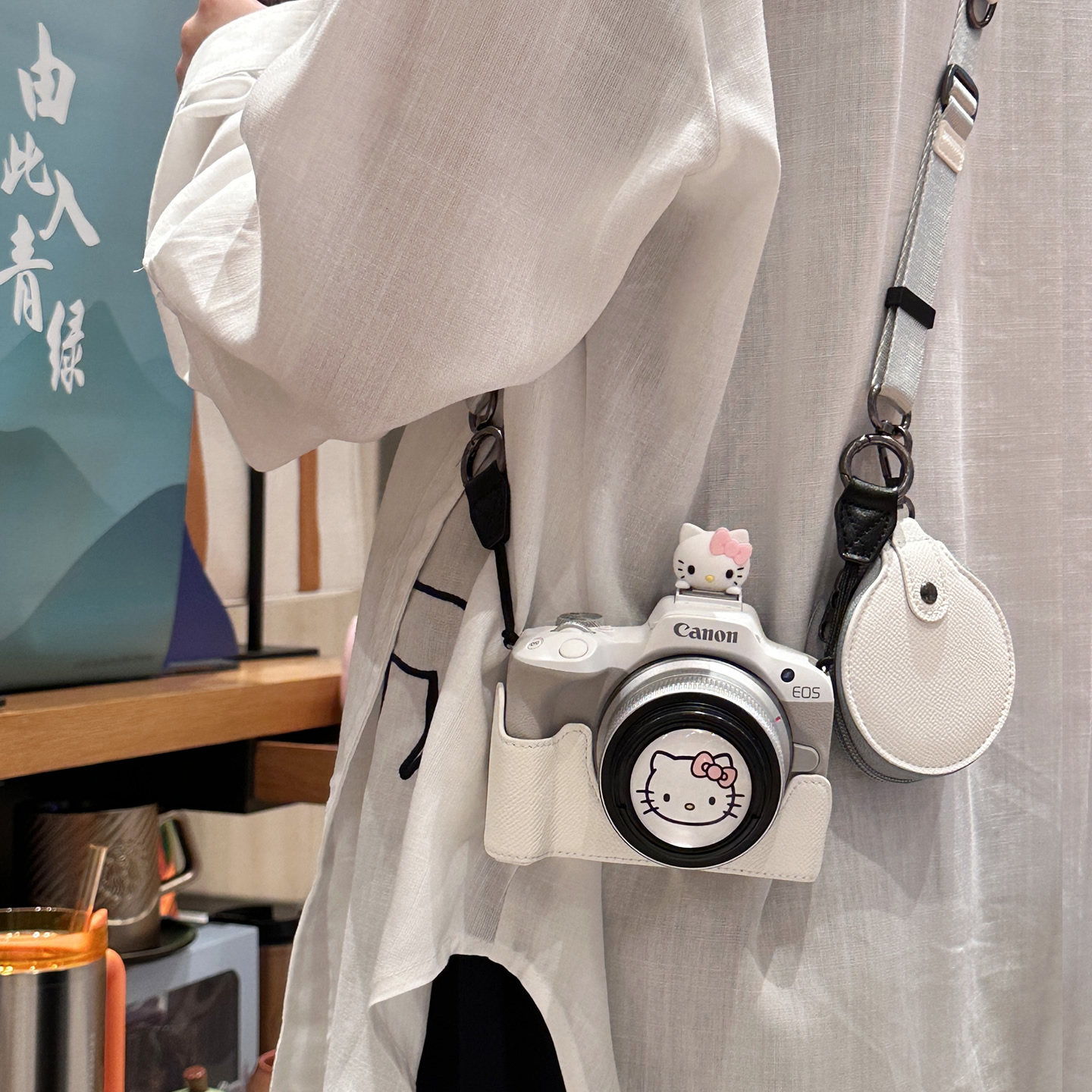 佳能R50保护套R10相机包可爱热靴R100200D二代底座R50V背带配件壳图片