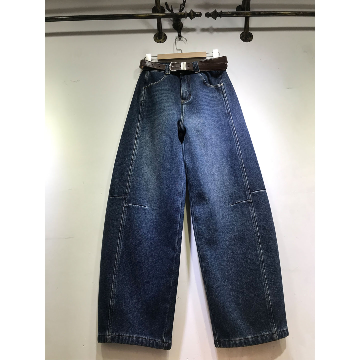 复合绒弯刀裤女侧边压线牛仔裤