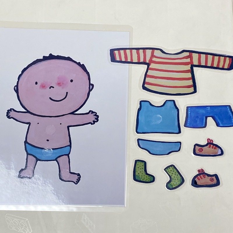 1岁小童益智启蒙反复粘贴纸婴儿卡通穿衣服换装自闭症玩具安静书