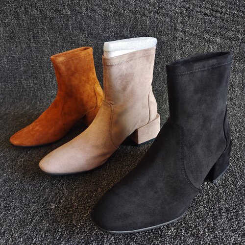 断码处理粗跟纯色弹力靴通勤耐穿