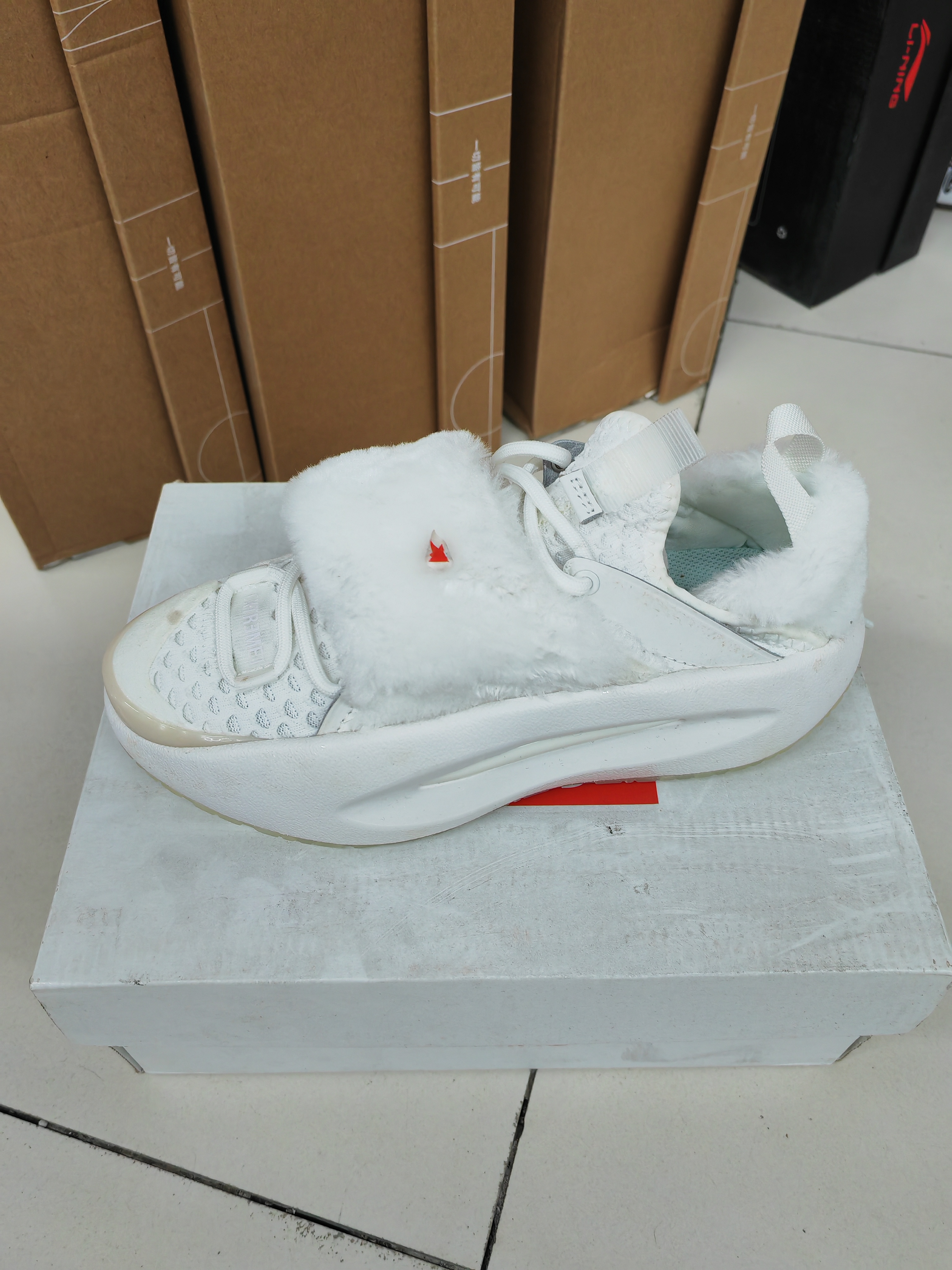 中国李宁云游lite蹦科技女士一体织面潮流运动休闲鞋