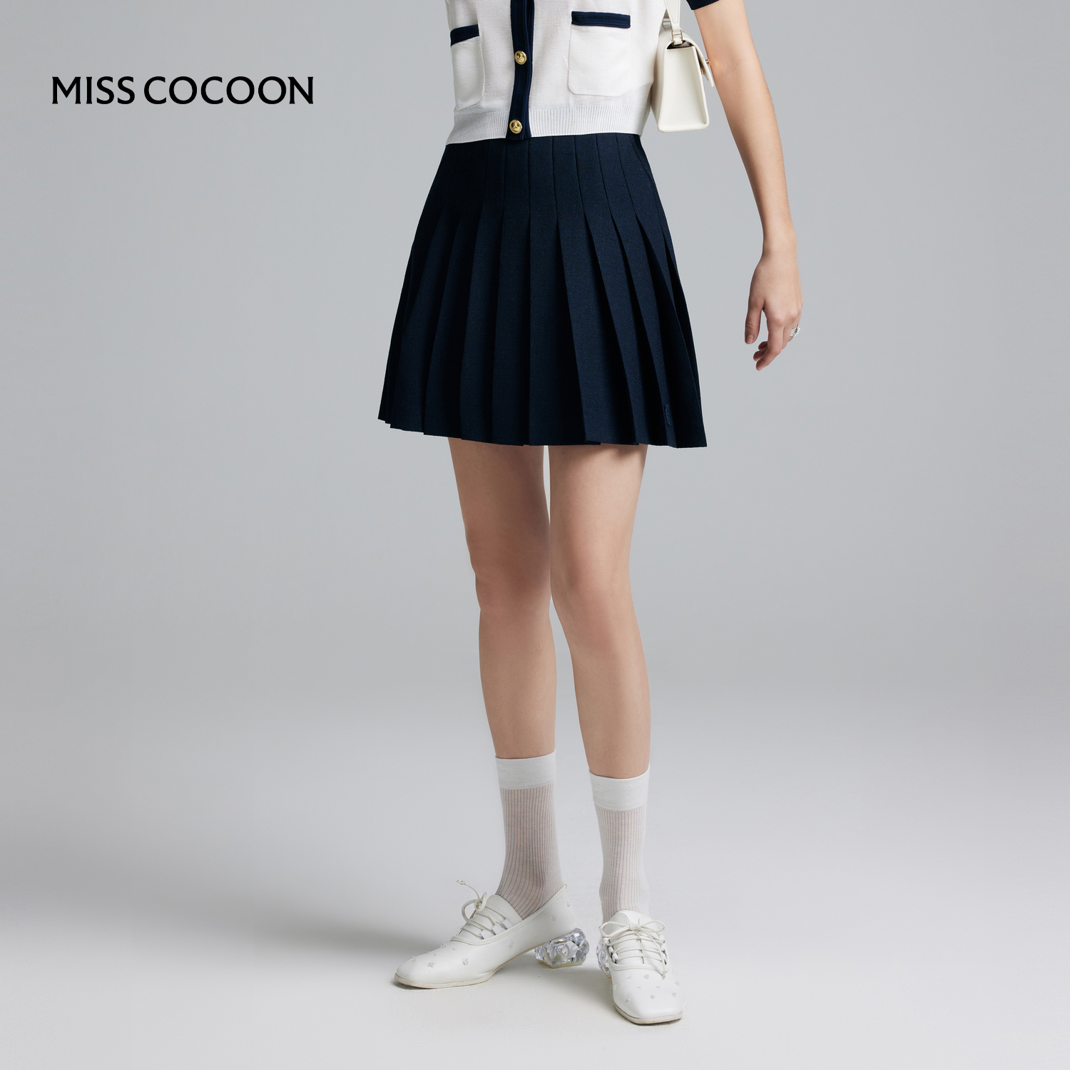COCOON可可尼 商场同款藏青色学院风时尚穿搭短款压褶百褶裙