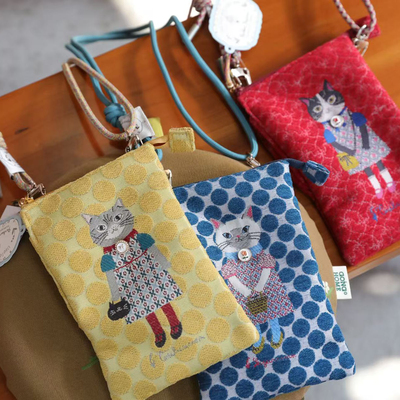 日本正品Kusuguru提花手机包斜挎