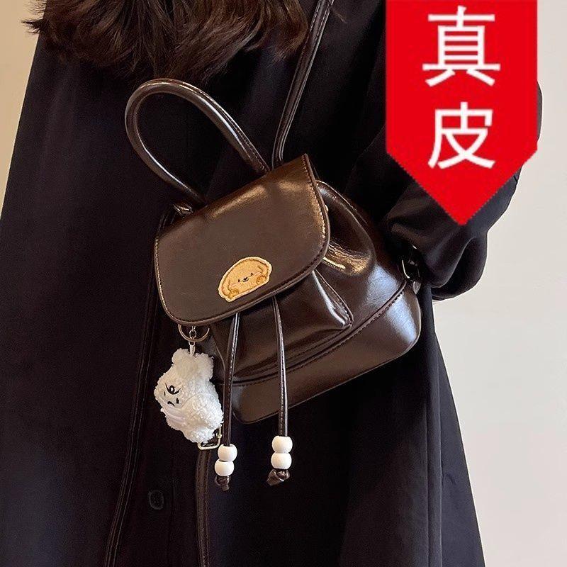 小斜挎包2026少女包包韩国时尚复古光面双肩包高级女真皮质感众感