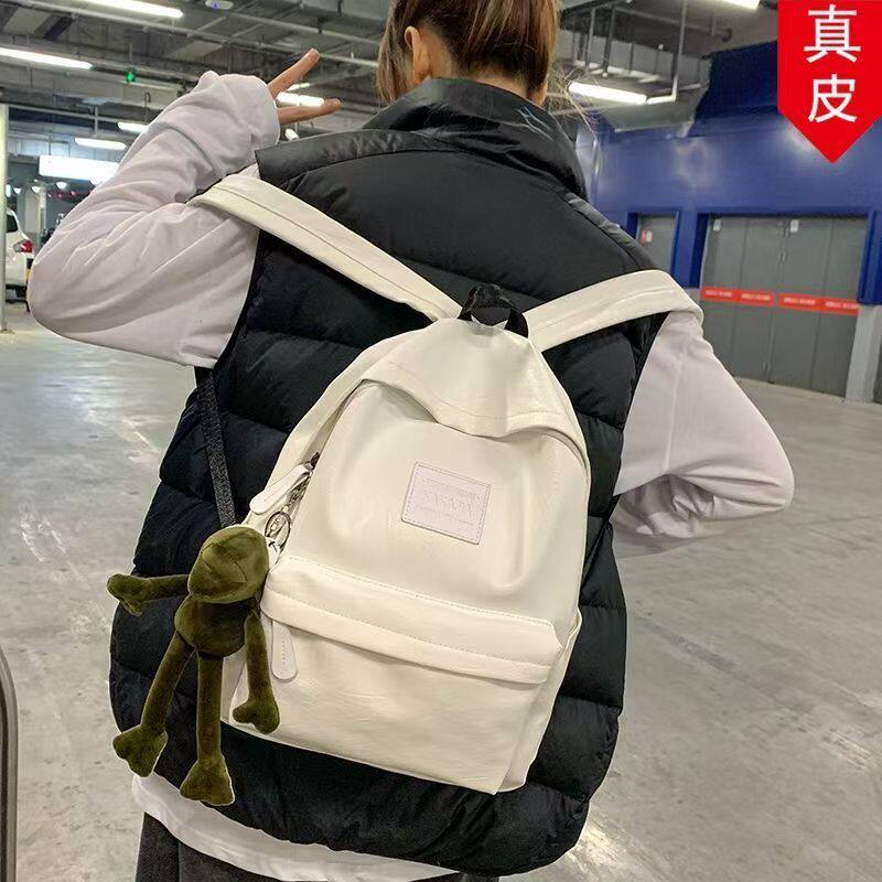港风复古女士包包2025休闲简约百搭大容量双肩包时尚书包男背包女