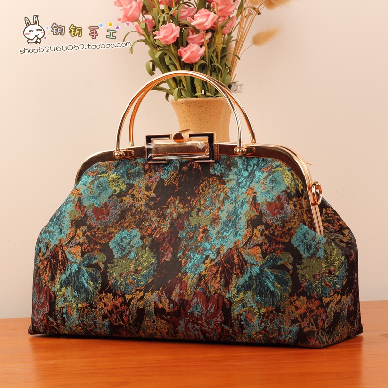 28cm弧形双拎手口金包