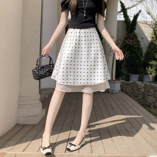 2026年春款通勤风缎面波点半身裙女修身显瘦A字拼纱裙百搭休闲裙