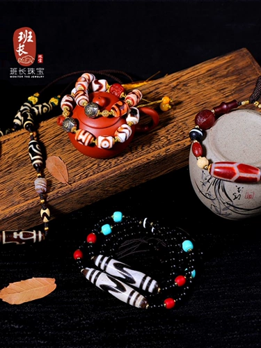 Лидер команда ювелирные украшения лотос бутылка бутылка Tiger Tiger Beads Cinnabar поставляет девять глазных овец тибетские бусины Zhenpin