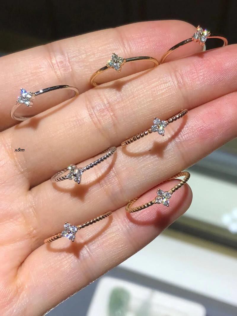 18k白金花朵钻石尾戒