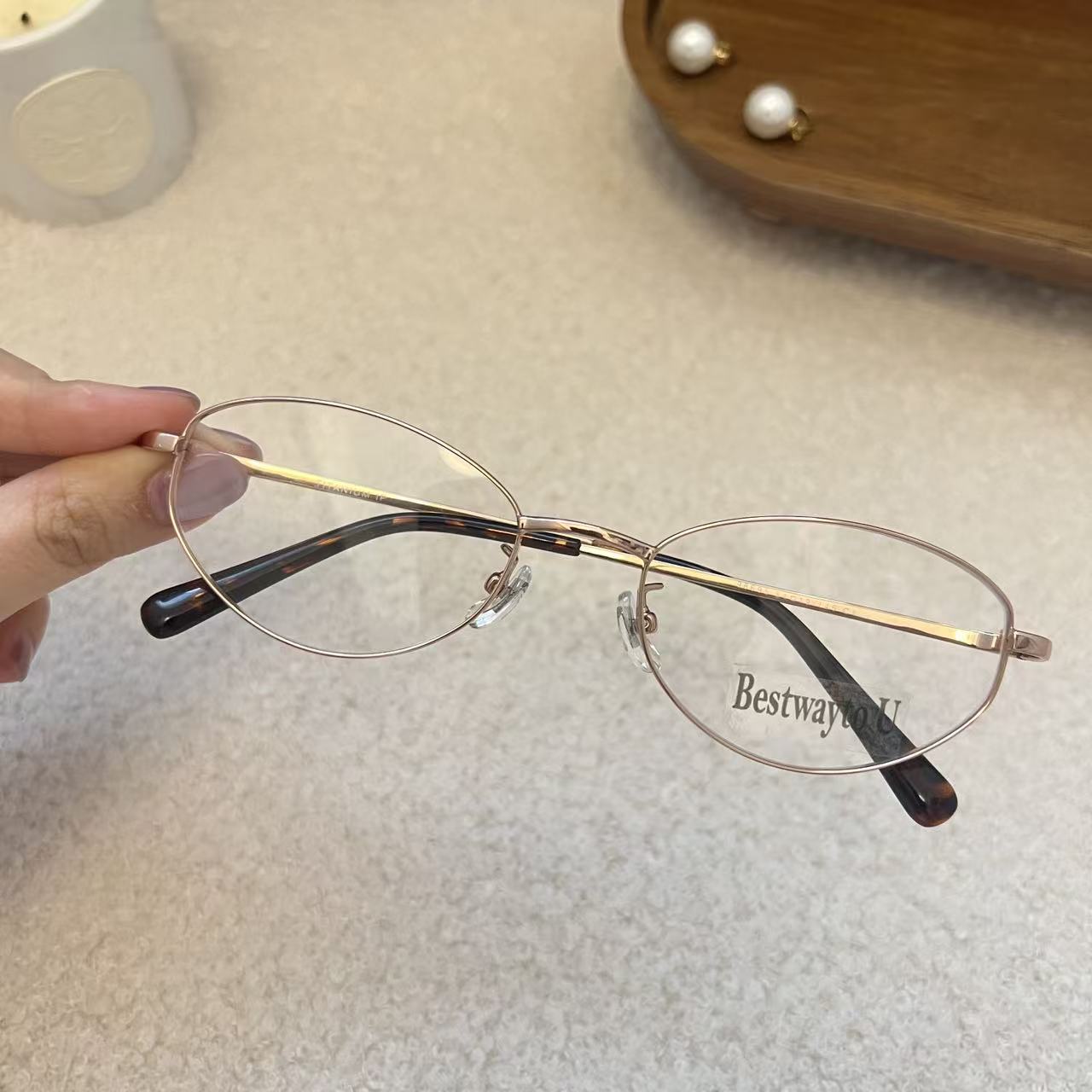 海的潮纯钛猫眼中小框显脸小