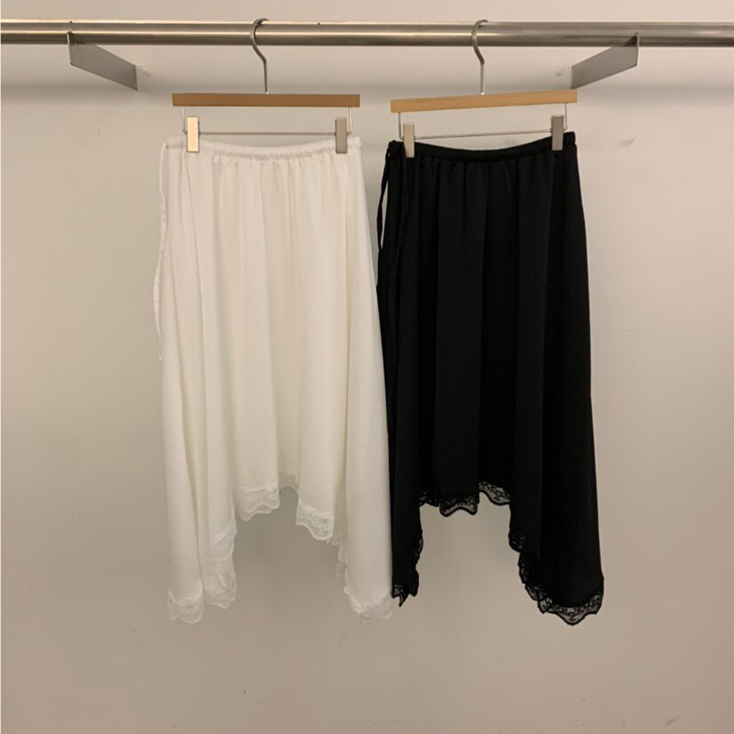 2026韩国东大门春夏花边不规则下摆蕾丝花边系带半身裙长裙子女