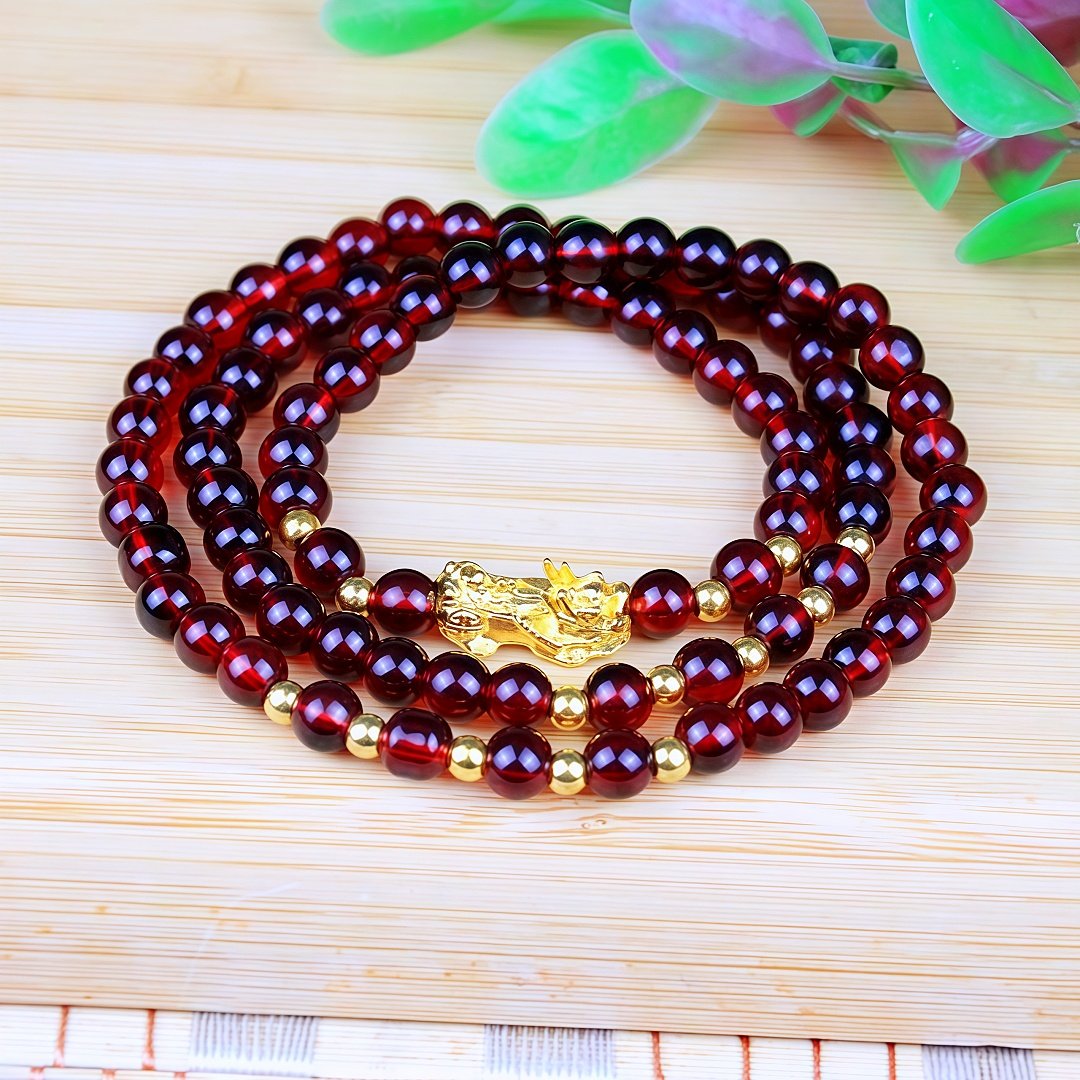 跑江湖庙会热卖民族风女款镀金仿黄金貔貅仿石榴石手串手链饰品